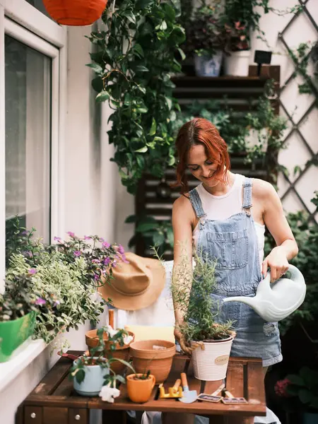 Woman Gardening Plants Balcony Nurturing Green Life Urban Environment — Stock Photo, Image