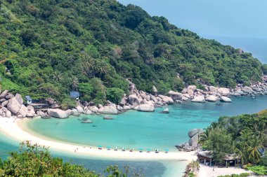 Beautiful white sand beach with green mountain and crystal clear waterblue sea, tropical ocean nature scenes with summer beach looking for Koh Nang Yuan island viewpoint, Surat Thani, Thailand. 