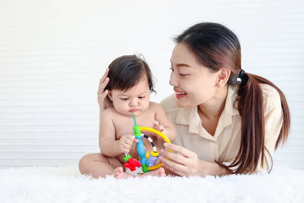 Portrait Happy Crawling Baby Sits Fluffy White Rug Mother Little — Stock Photo, Image