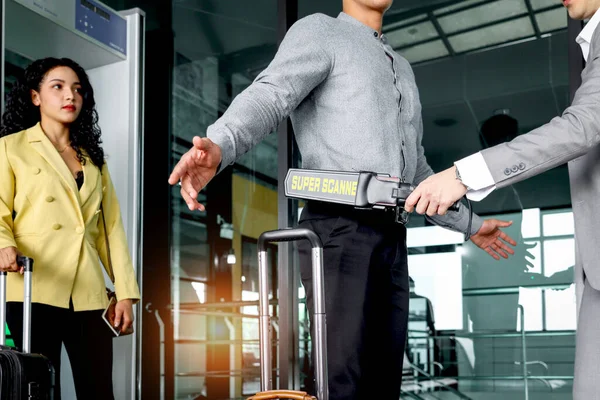Security Man Holding Metal Weapon Detector Scanner Checking Male Passenger — Stock Photo, Image