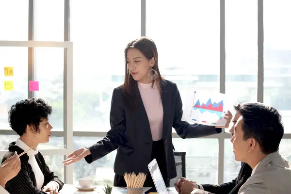 Successful beautiful businesswoman shares experience success and gives presentation at conference meeting desk, businesspeople have discussion about project work in office, people working at workplace