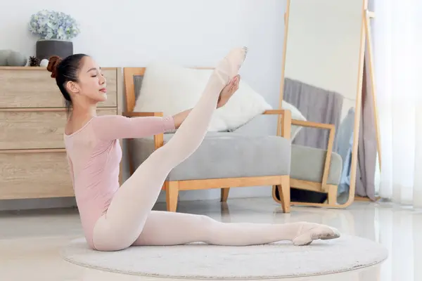 Beautiful Young Asian Female Ballerina Practicing Ballet Dance Living Room Стоковое Фото