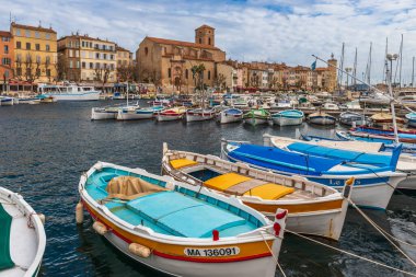 Provencal boats in front of the church in the port of La Ciotat, in the Bouches-du-Rhone, Provence, France