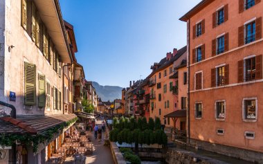 Quai de l'Evch and rear of the Palais de l'Ile, during the day, in Annecy, Haute-Savoie, France