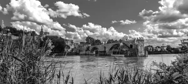 stock image B and W, Panorama of Avignon with the Saint Benezet bridge over the Rhone river, in Vaucluse, in Provence, in France