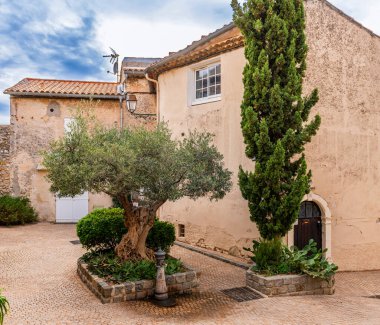 Street and facades in the village of Castellet, in the Var near Toulon, Var, Provence, France. clipart