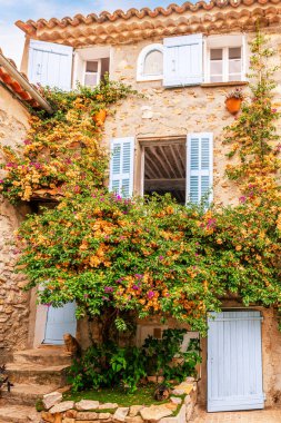 Street and facades in the village of Castellet, in the Var near Toulon, Var, Provence, France. clipart