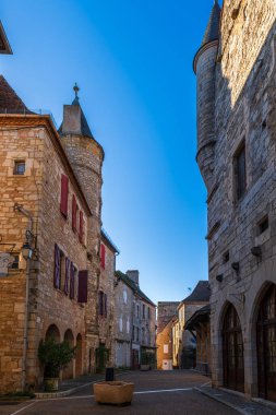 A street in the beautiful medieval village of Martel, in the Lot, in Occitanie, France clipart