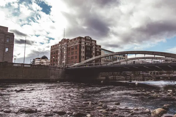 Vintage building and bridge overlooking the river