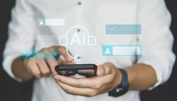 İşadamı yapay zeka teknolojisiyle akıllı telefon kullanıyor dijital dönüşüm konsepti için akıllı telefon ile iletişim kuruyor.