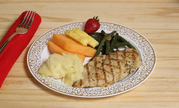 Grilled Chicken and Vegetable Dinner With Fruit at Wedding