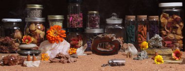 Agatized Coral With Quartz Crystals and Flowers With Australian Red Sand on Meditation Altar