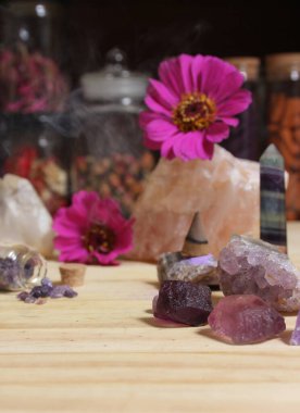 Amethyst Crystals With Flowers and Incense Cone on Meditation Altar