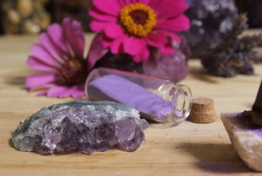 Amethyst Crystals With Flowers and Incense Cones on Meditation Altar