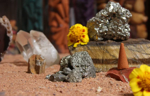 Yellow Flowers With Pyrite Rocks and Crystals on Australian Red Sand