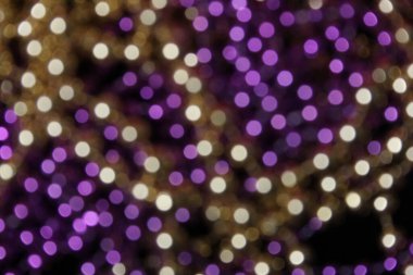 Purple and Gold Abstract Blurred Bokeh Background