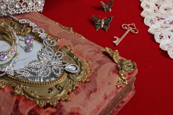 Crystal Rhinestone Jewelry on Victorian Era Book