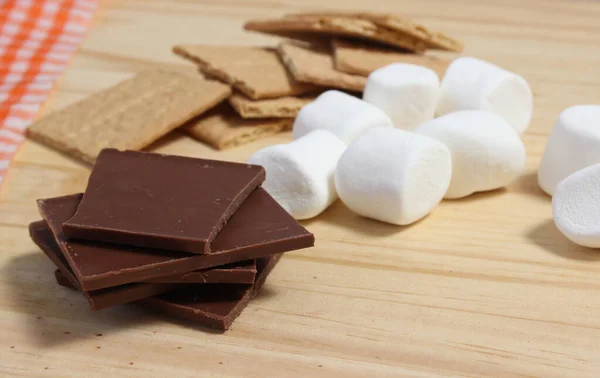 stock image Smores. Marshmallow with Chocolate and Graham Crackers in Rustic Kitchen