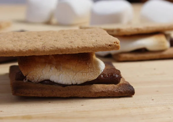 Stock image Smores. Marshmallow with Chocolate and Graham Crackers in Rustic Kitchen