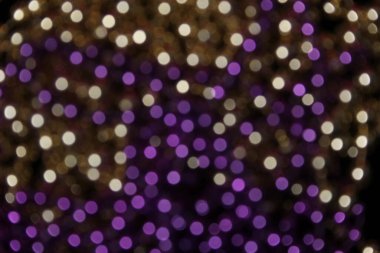 Purple and Gold Abstract Blurred Bokeh Background