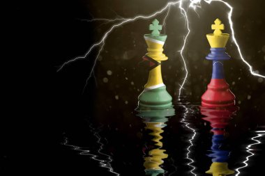 Guyana ve Venezuela bayrakları satranç kralının üzerine boyanmış. 3 boyutlu illüstrasyon: Guyana, Venezuela krizine karşı.