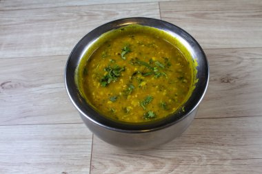 dalimbi usal Maharashtrian popular nutritious breakfast, isolated over a rustic wooden background, selective focus clipart