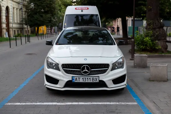 stock image  Ivano-Frankivsk, Ukraine - 10 Aug 2024: Mercedes-Benz CLA is a series of luxury subcompact executive car, front view. Car parking on street