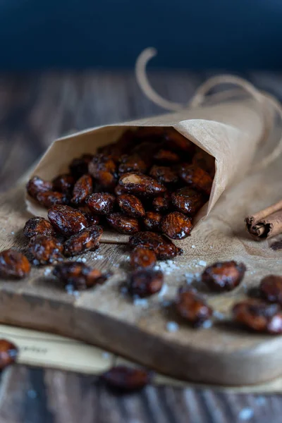 stock image Christmas candied almonds. Cinnamon Roasted Almonds with salt and cinnamon. Christmas food and mood. High quality photo