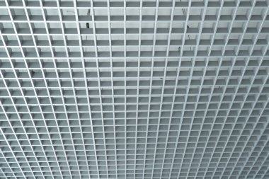 grid ceiling background is beautiful because it is designed to cover traces of original ceiling resulting in modern grid ceiling pattern. backdrop of ceiling is decorated with steel in grid pattern.