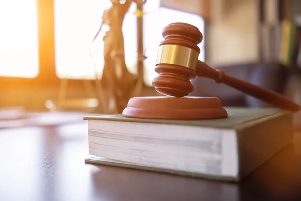 stock image wooden judge gavel on table as symbol of justice for use in legal cases judicial system and civil rights and social justice concept with judge. concept of legislation to judge lawsuits with justice.