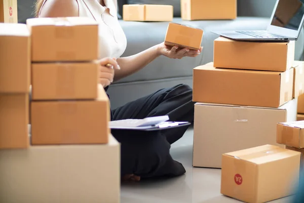 Many parcel boxes are prepared and inspected before calling shipping company to pick up parcel for delivery. entrepreneurs SMEs have prepared parcel boxes for delivery after receiving orders