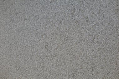 Arka plan eski beton duvarda çatlaklar ve hava ve yaştan dolayı bozulma belirtileri var. Doğal dokulara sahip beton arkaplanlar tasarımlar için harikadır ve Kopya Boşluğu arka planlarını içerir