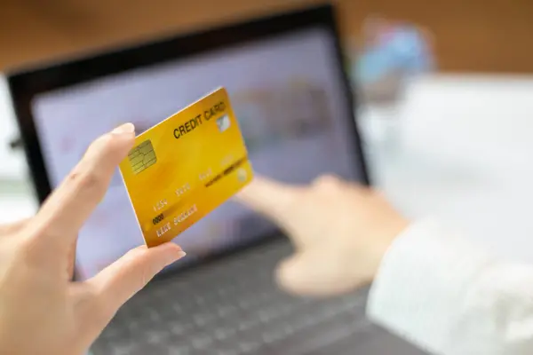 business woman is using credit card to pay for products online when ordering products from store through an online website because using credit card to pay for products brings convenience in shopping