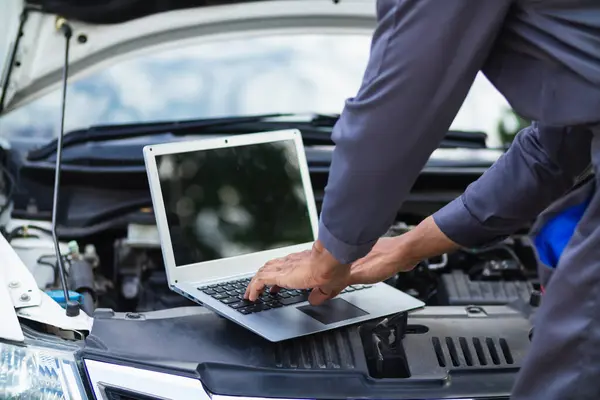 stock image car service center mechanics are checking condition car and engine make sure they are ready use and in perfect condition according center warranty. periodic vehicle inspections for safety in driving.