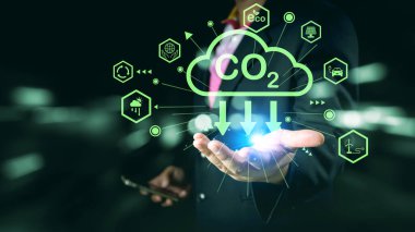 Dünya 'yı, Dünya' yı, Dünya 'yı, sürdürülebilir yaşamı, ekolojik çevreyi, iklim acil durumu, dünya çevre günü kavramı, küresel ısınma içeriğini koruyan iş adamı..