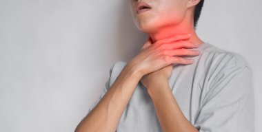Tightness at the neck of Asian, Myanmar man. Concept of sore throat, pharyngitis, laryngitis, esophagitis, thyroiditis, dysphagia, choking or gasping. clipart