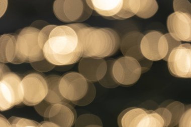 Gece Bokeh ışıklandırma arka planı, bulanık, parıldayan renkli ışıklar, kopyalama alanı. Neşeli Noel ışıltısı. Kutlama - özel olay konsepti. Lüks doku efekti fotoğrafçılık.