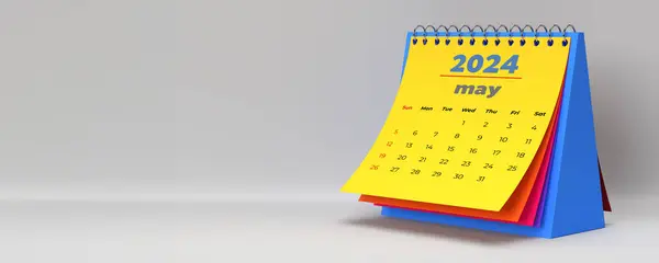 Renkli 2024 Mayıs aylık masa takvimi. Beyaz arkaplandaki 3D yatay sayfa ve kopyalama alanı. 12 aylık yerleşim planı. Hafta pazar günü başlıyor. Hafta sonları kırmızı işaretli.