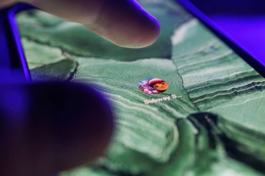 Paris, France - 2023 February 16: Subway surf game app on smartphone screen. Close up shot of Subway surf game app