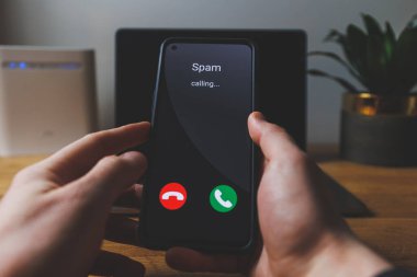 Spam call on phone. Spammer incoming call concept. High quality photo