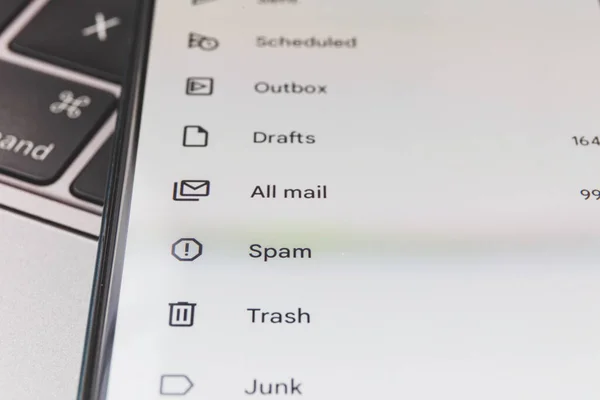 Spam in email inbox. Email inbox on smartphone - junk, trash, spam. High quality photo
