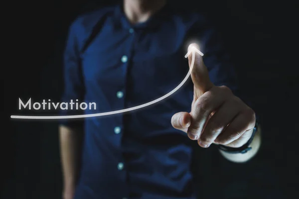 stock image Man points with finger at growing motivation arrow. The concept of motivation. High quality photo