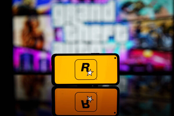 Paris, France - 2023 November 8: Rockstar games company logo on screen. Rockstar is international computer games developer. High quality photo