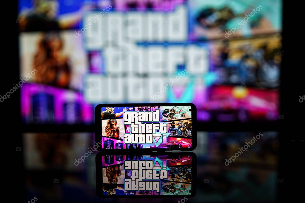 Paris, France - 2023 November 8: GTA VI logo and Rockstar games company logo in background on screen. Rockstar games announces to release GTA SIX video game. High quality photo