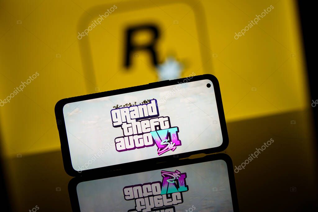 Paris, France - 2023 November 8: GTA VI logo and Rockstar games company logo in background on screen. Rockstar games announces to release GTA SIX video game. High quality photo