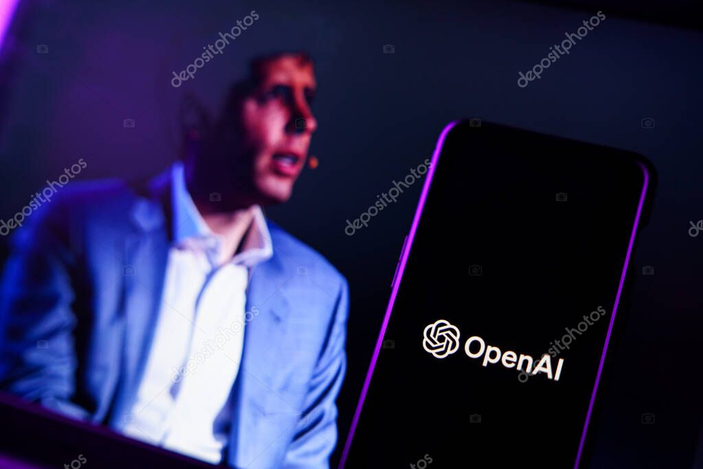 Kaunas, Lithuania - 2023 November 19: OpenAI logo and Sam Altman in background on screen. OpenAI fires CEO Sam Altman. High quality photo