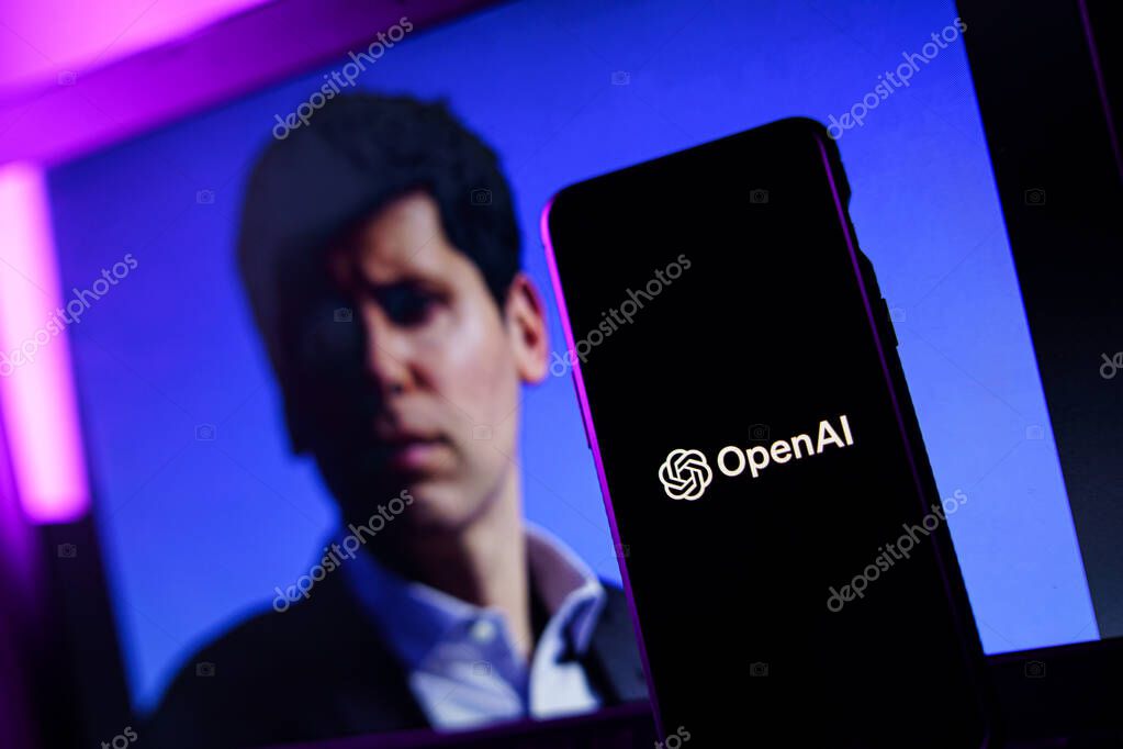 Kaunas, Lithuania - 2023 November 19: OpenAI logo and Sam Altman in background on screen. OpenAI fires CEO Sam Altman. High quality photo
