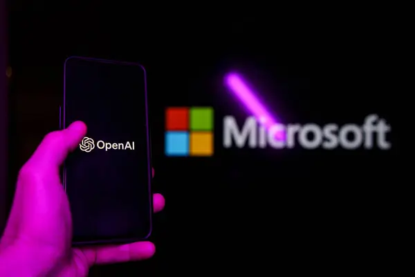 stock image Kaunas, Lithuania - 2023 November 20: OpenAI logo and Microsoft logo in background displayed on the screens. High quality photo