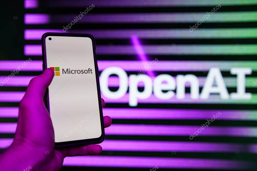 Kaunas, Lithuania - 2023 November 20: OpenAI logo and Microsoft logo in background displayed on the screens. High quality photo