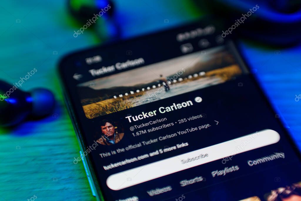 Kaunas, Lithuania - 2024 March 1: Tucker Carlson youtube channel on smartphone screen